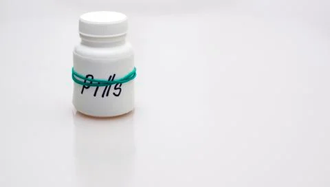 Plastic bottle with pills 스톡 사진