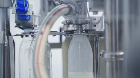 Plastic Bottle plant. Milk bottling line for processing filling Bottle and Stock-Footage 334587794