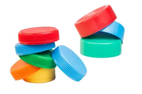 Plastic bottle screw caps isolated on white Foto stock