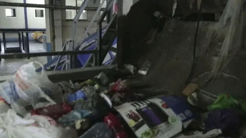 Plastic bottle on the sorting conveyor. Waste sorting. Recycling waste Stock Footage 70353113