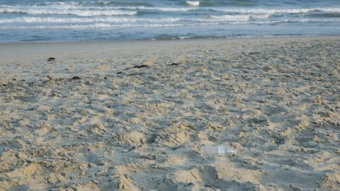 Plastic bottle trash left on the beach 스톡 동영상 116747661