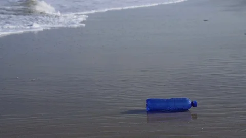 Plastic bottle (washed up) at a beach in South America of the Pacific Ocean Stock Footage 115910413
