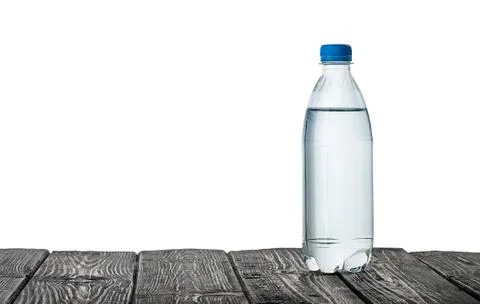Plastic bottle of water on the table Stock Photos