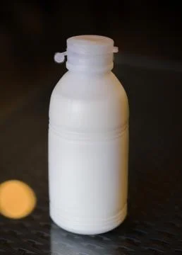 PLASTIC BOTTLE OF WHITE MILK Stock Photos