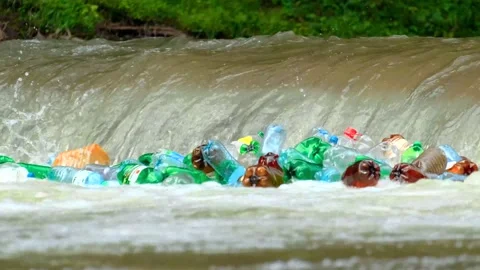 Plastic bottles and garbage in river water polluting environment Stock-Footage 202292927