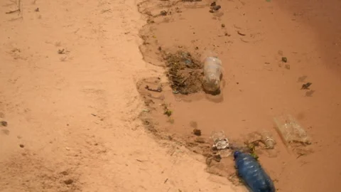 Plastic Bottles And Other Garbage On Yellow Sandy Beach 库存影片 160097973