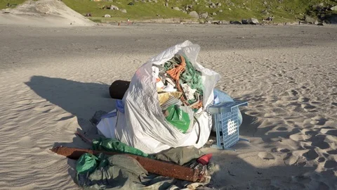Plastic bottles and other trash on sea beach Stock Footage 126151218