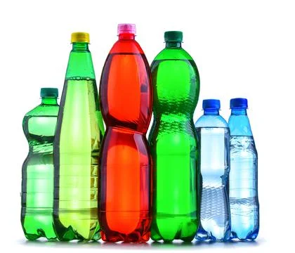 Plastic bottles of assorted carbonated soft drinks isolated on white. Foto stock