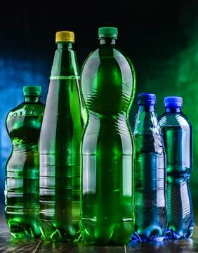 Plastic bottles of assorted carbonated soft drinks. Stock Photos