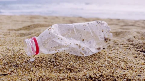 Plastic bottles on the beach and littered garbage Video stock 265571238
