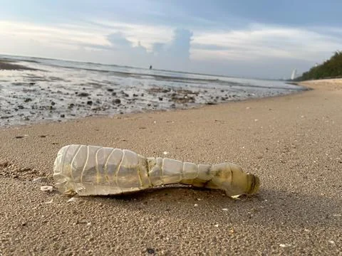 Plastic bottles on the beach Stock Photos