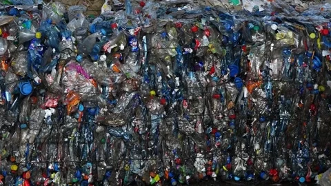 Plastic bottles compressed into bales and ready for recycling Video stock 278514515