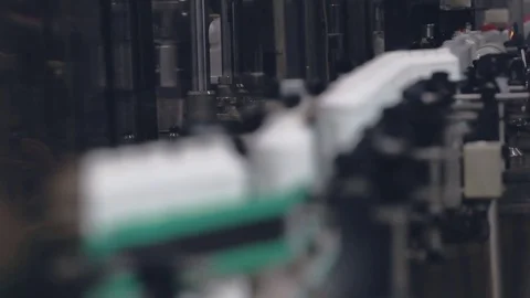 Plastic bottles on conveyor belt Stock Footage 75780159