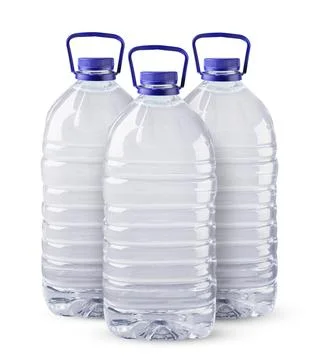 Plastic bottles with drinking water 5 liters on a white background. Isolated Stock Photos