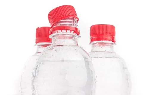 Plastic bottles of drinking water isolated Stock Photos