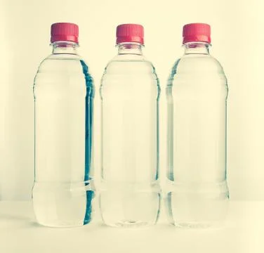 Plastic bottles of drinking water Stock Photos