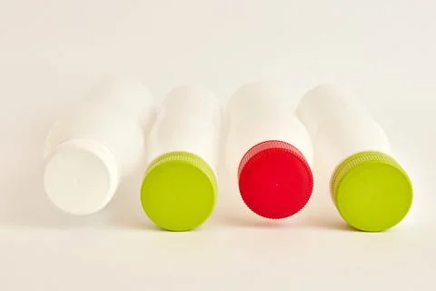 Plastic bottles for drinks on a white background. Plastic packaging. Disposal of Stock Photos