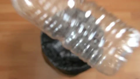 Plastic Bottles Dropped Into Bin Slow Motion Stock Footage 157173002