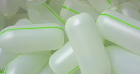 Plastic Bottles with Green Stripes Piled Up Stock Footage 313063627