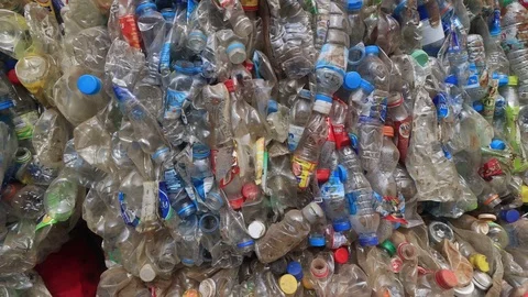 Plastic bottles piled up for recycling Stock Footage 123180677