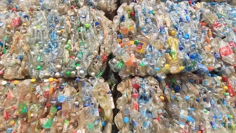 Plastic bottles piled up for recycling Stock Footage 123764024