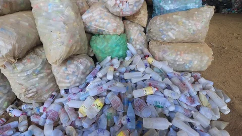 Plastic bottles piled up for recycling Stock Footage 124936077