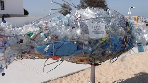 Plastic Bottles &amp; Plastic Fish Trash Can Stock Footage 116642709