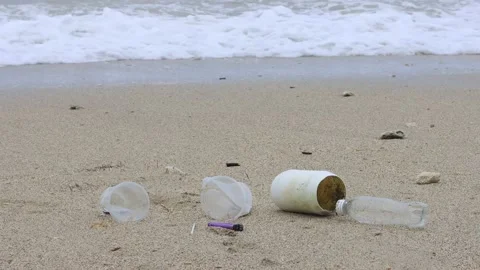 Plastic bottles pollute beach Stock Footage 130226945
