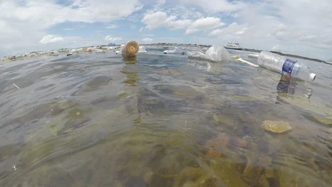 Plastic bottles pollute sea Stock Footage 112771315