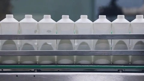 Plastic bottles in production line Stock Footage 75171379