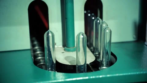 Plastic bottles for purified drinking water before inflating during production Vidéo 149603825