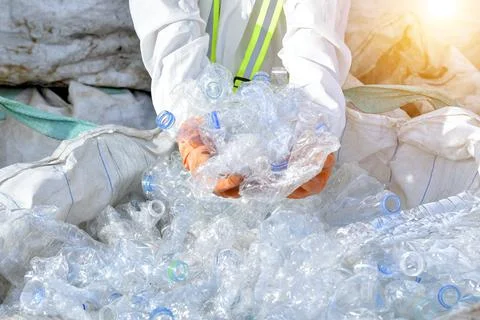 Plastic bottles recycle background concept, picking up garbage plastic bottle Stock Photos