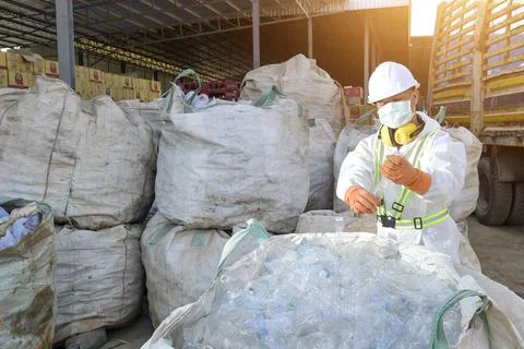 Plastic bottles recycle background concept, picking up garbage plastic bottle Stock Photos