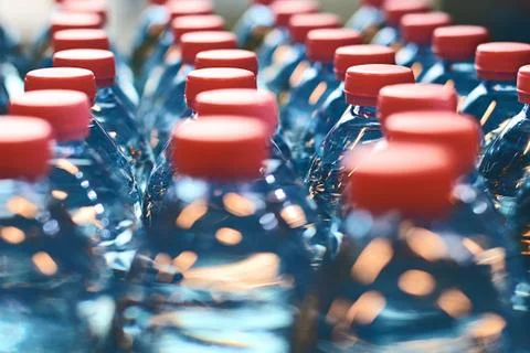 Plastic bottles with red caps Stock Photos