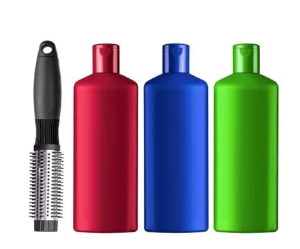 Plastic bottles shampoo and comb isolated on white background Fotos Stock