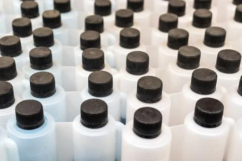 Plastic bottles standing in a row . the view from the top 스톡 사진
