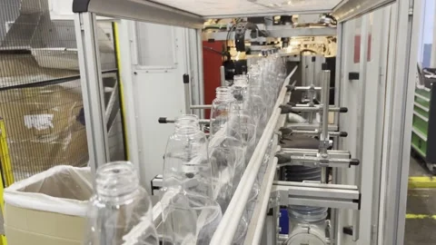 Plastic bottles on the transporter line. Trasparent bottles. Stock Footage 265788352
