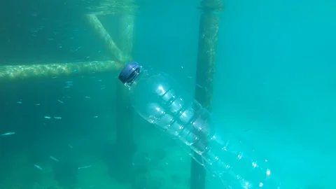 Plastic bottles trash in ocean Stock Footage 110742789