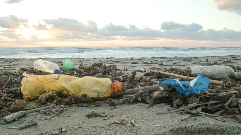 Plastic bottles trash pollution on contaminated ocean sea coast,environmental Stock Footage 146634815