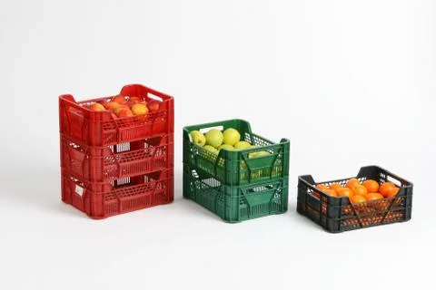 Plastic box with apples on a white background Stock Photos