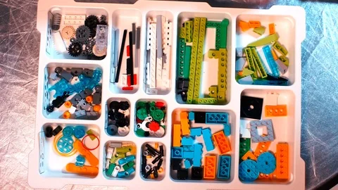 Plastic box for folding the children's designer cubes. Video stock 123750811