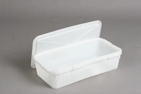 Plastic box with a lid, on a white background Stock Photos