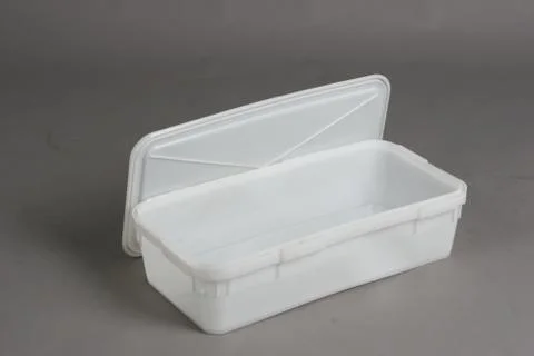 Plastic box with a lid, on a white background Stock Photos