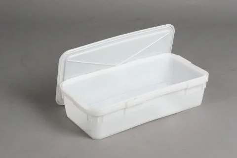 Plastic box with a lid, on a white background Stock Photos