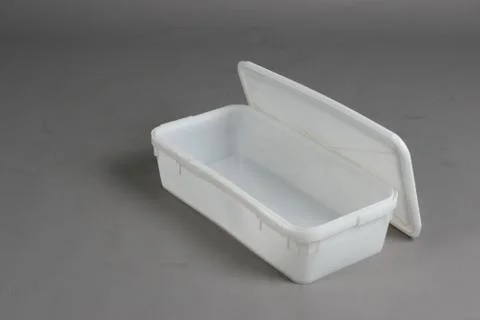 Plastic box with a lid, on a white background Stock Photos
