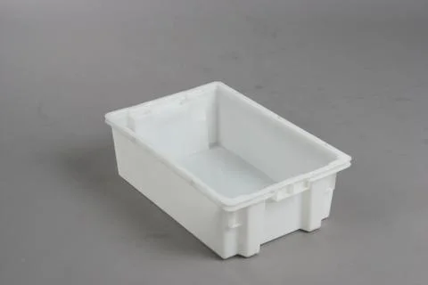 Plastic box with a lid, on a white background Stock Photos