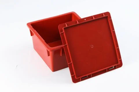 Plastic box with a lid, on a white background Stock Photos