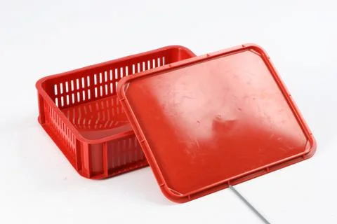 Plastic box with a lid, on a white background Stock Photos