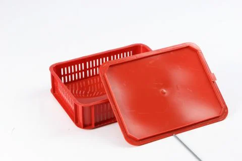 Plastic box with a lid, on a white background Stock Photos