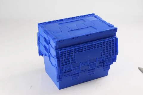 Plastic box with a lid, on a white background Stock Photos